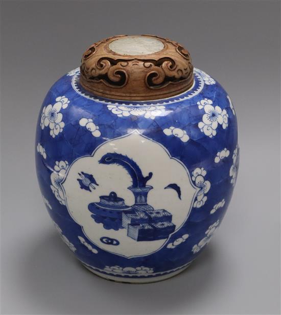 An 18th century Chinese blue and white jar and cover, the cover with inlaid jade plaque overall height 24cm